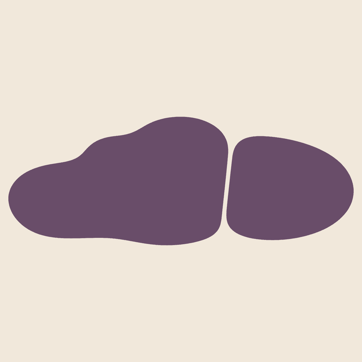 Irregular and smooth aubergine forms divided by a clean cut
